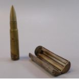 Heavy calibre brass bullet and cartridge, now opening as a needle case, marked 'K41 and F1/Z',