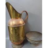 Large beaten copper and brass single handled jug together with a middle eastern design brass