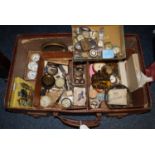 Leather suitcase comprising assorted items, mainly clock parts and watches, pocket watches,