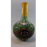 Chinese reticulated pierced majolica style stoneware bottle vase with extended neck. Decorated