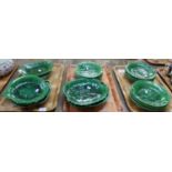 Three trays of Wedgwood (unstamped) and other Majolica dark green cabbage ware pottery: ten