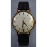 Audax seventeen jewel 9ct gold gentleman's wristwatch with satin face having baton numerals, and