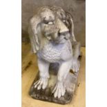 Large Weathered marble garden statue in the form of a stylised seated hound dog. 71cm long, 74cm