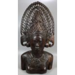 Carved hardwood Balinese bust of a woman in unusual headdress. Probably 20th century. 53cm high