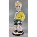 Large Art Deco Lenci ceramic figure of a boy, designed by Sandro Vacchetti, wearing a yellow and