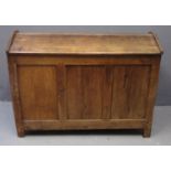 19th Century Welsh oak corn bin, the domed and moulded top above three panels to each side, the