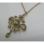 9ct gold Art Nouveau pendant set with peridot and pearls on 9ct gold chain. Approx weight 7.8 grams.