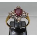 18ct gold ruby and diamond ring. Ring size N&1/2. Approx weight 3.4 grams. (B.P. 21% + VAT)