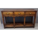 19th Century oak dresser with pot board base, the moulded top above an arrangement of three drawers,