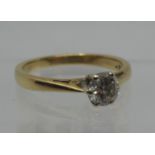 18ct gold diamond solitaire ring. Estimated diamond weight 0.50cts. Ring size Q. Approx weight 3.9