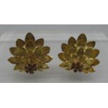 A pair of 18ct gold and ruby lotus flower earrings with clip fittings. Approx weight 10.5. (B.P. 21%