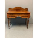 Victorian mahogany side table, the shaped gallery back and moulded top above an arrangement of