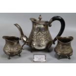 White metal, probably Indian silver, three piece baluster shaped bachelor's teaset. The individual