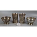 A group of silver shooting trophy cups or beakers to include: Bisley 1906 and another similar.