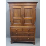 19th Century Welsh oak two stage press or linen cupboard, the moulded cornice above two blind and