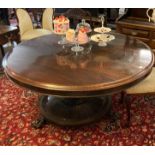 19th Century rosewood centre or dining table, the moulded top above a vase shaped pedestal and
