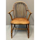 19th Century elm and ash Windsor armchair, on a moulded seat with turned supports. (B.P. 21% + VAT)
