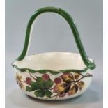 19th Century Llanelly pottery Shufflebotham basket with high loop handle, hand painted with