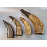 A group of four probably 19th century and earlier horn powder and shot flasks, one engraved with