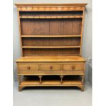 19th Century pale oak two stage rack back pot board dresser, the moulded cornice above boarded