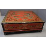 Chinese lacquered coffee or centre table of low proportions, the top overall decorated with exotic