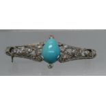 An Art Nouveau diamond and turquoise brooch. Approx weight 4.3 grams. (B.P. 21% + VAT)
