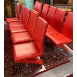 Set of eleven red faux leather upholstered Z shaped cantilever mid Century design dining chairs on