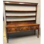 19th Century West Midlands oak open back two stage dresser, the moulded cornice above an open back