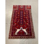 Deep red ground Sardius prayer mat. 184x97cm approx. (B.P. 21% + VAT)