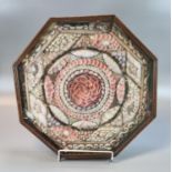 19th century sailor's valentine seashell mosaic in octagonal framed case with glass front. 35x34cm