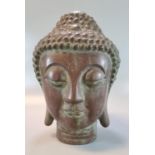 A Thai or Siamese style cast bronze Buddha head. Probably 19th or 20th century. 27cm high approx. (