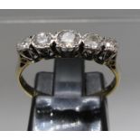 18ct gold five stone diamond ring. Ring size L & 1/2. Approx weight 2 grams. (B.P. 21% + VAT)