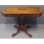 Victorian walnut and mixed woods inlaid octagonal card/games table, the hinged lid revealing a red