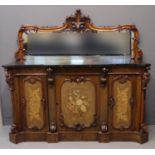 Victorian rosewood mirror back sideboard, the ornately carved back above a shaped black veined