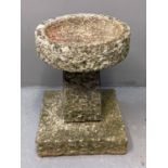 Granite weathered pedestal birdbath with circular top on a square base. (B.P. 21% + VAT)