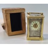 Late 19th/early 20th Century brass carriage clock, having ceramic Arabic chapter ring, together with