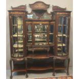 Late Victorian mahogany Rococo style ornately carved display cabinet, overall with floral inlaid