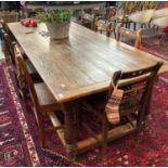 18th Century oak cleated seven plank top refectory table standing on baluster turned legs. 257 x 102