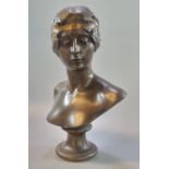 Ferdinand Barbedienne (French 1810-1892), a patinated Art Nouveau bronze bust of a young woman