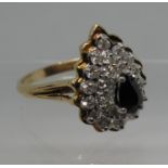 14ct gold diamond and sapphire pear shaped ring. Ring size T. Approx weight 4.9 grams. (B.P. 21% +