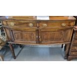 Late 19th early 20th century mahogany bow front side board standing on tapering legs and splayed