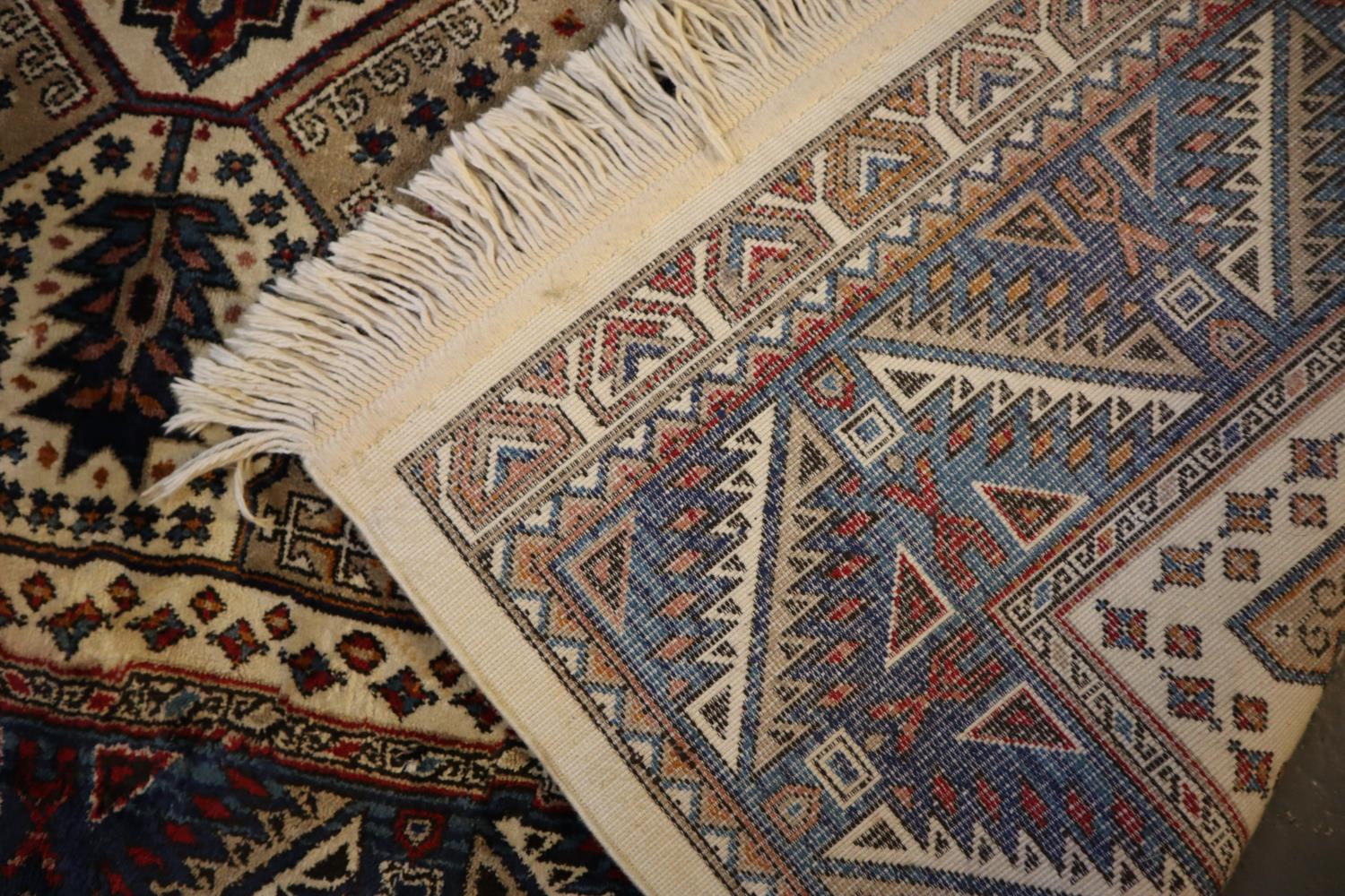 Small middle eastern design cream and blue ground carpet, having geometric floral and foliate - Image 4 of 4