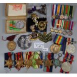 Quantity of assorted military medals including: two dress miniature groups for First and Second