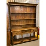 19th century style oak two stage rack back pot board dresser, the boarded rack above projecting base