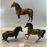 Two Beswick horses together with a Beswick donkey. (3) (B.P. 21% + VAT)