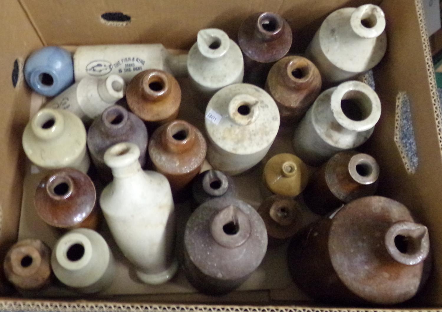 Box of stoneware bottles, some marked including; 'The Fish and Ring brand is the best', Barrett & Co