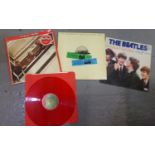 Three vinyl LPs of The Beatles to include; 1962-66 double album on red vinyl, 'The Beatles at the