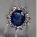 9ct gold synthetic sapphire and moissanite ring.