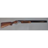 Italian Acier Cockerill 12 bore over and under double barreled ejector shotgun having 28 inch