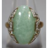 9ct gold Chinese design jade dress ring with diamond shoulders. 4.8g approx. Size O. Cased. (B.P.